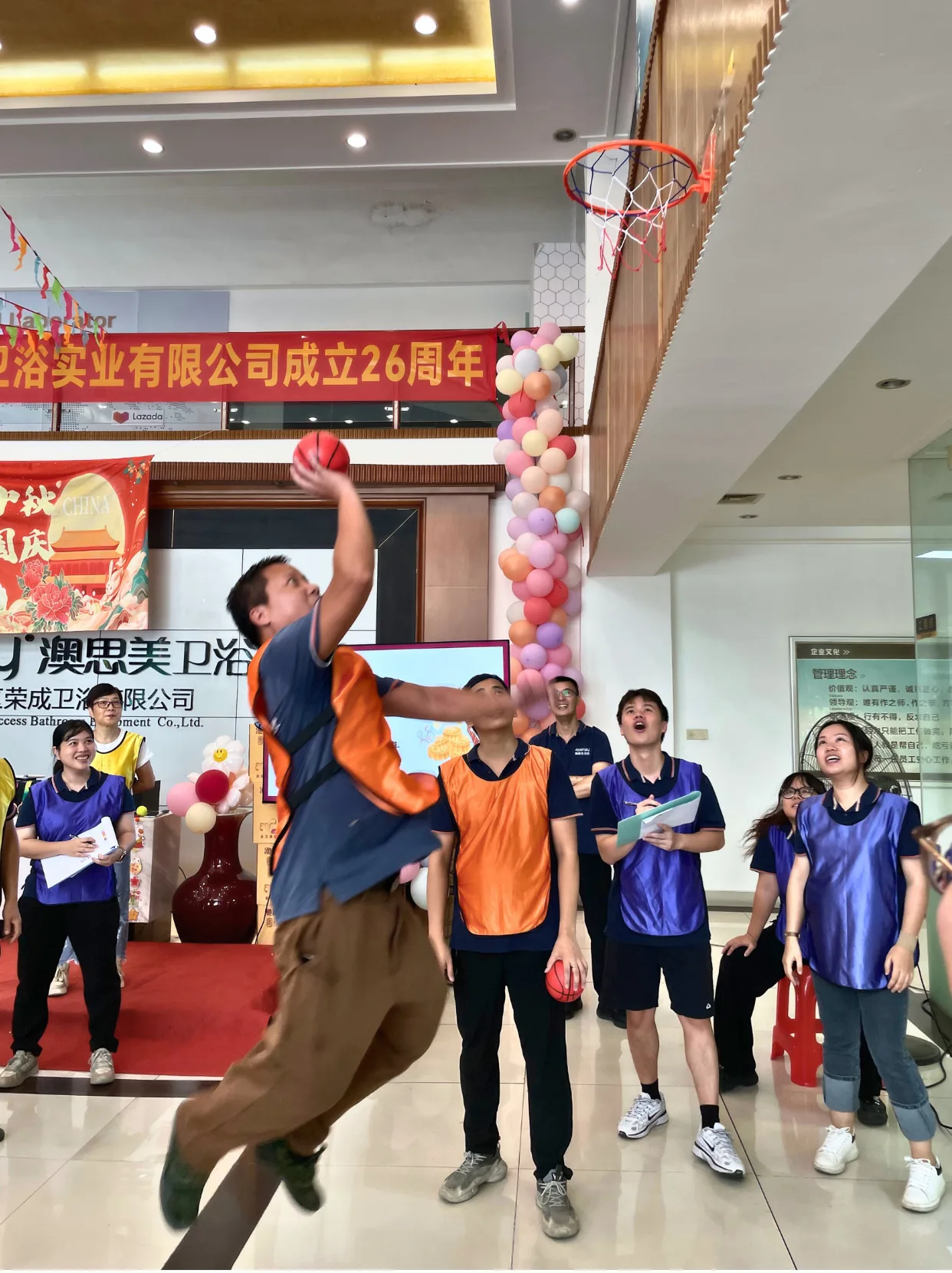 Staff competing in a team-building exercise - creator of custom medicine cabinets.