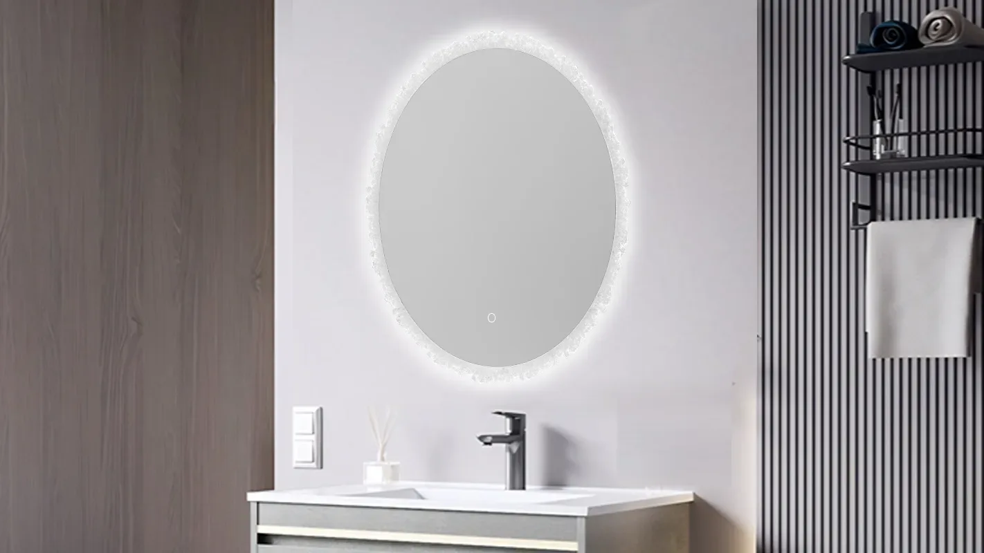 Luxury hotel bathroom featuring a glowing acrylic framed LED mirror.
