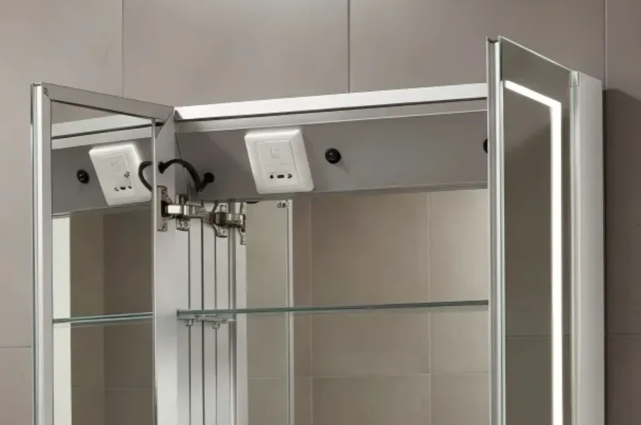 Internal GFCI power socket inside an led bathroom medicine cabinet, featuring a clean, unlit interior.