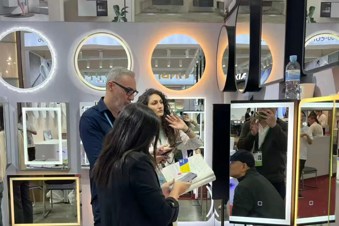Bathroom mirror and medicine cabinet manufacturers at a trade show